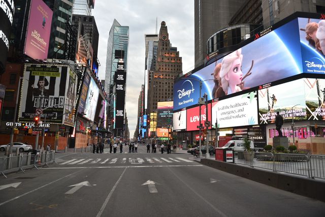 A completely empty Times Square, save for a dozen police officers